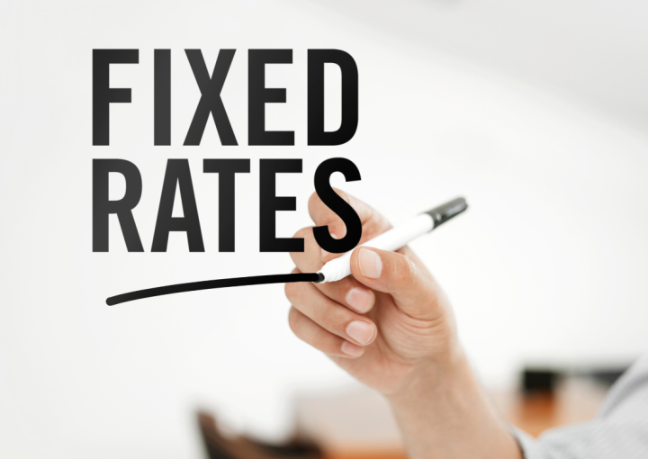 "Fixed rates" written on an acrylic board.