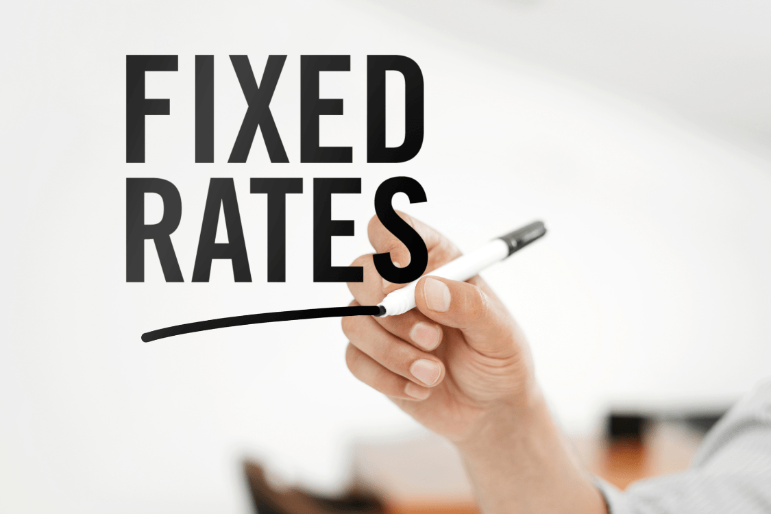 "Fixed rates" written on an acrylic board.