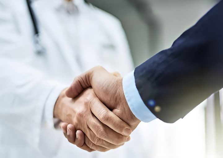 Medical professionals shaking hands