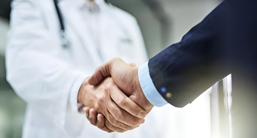 Medical professionals shaking hands